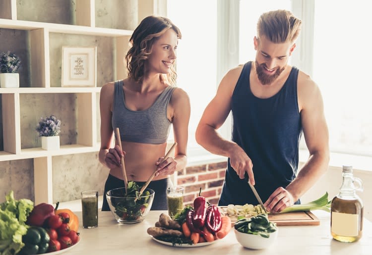 Couple making a meal together